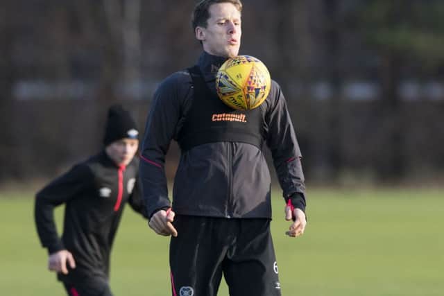Hearts captain Christophe Berra takes part in training ahead of the trip to Livingston. Picture: Paul Devlin/SNS