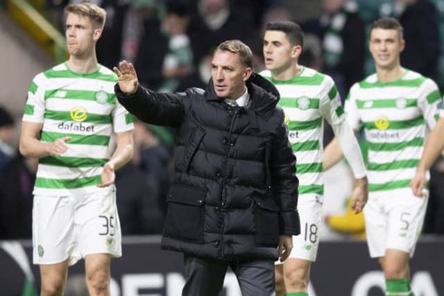 Celtic manager Brendan Rodgers celebrates qualification with his players at full time. Picture: Craig Williamson/SNS