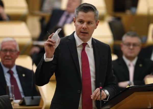 Derek Mackay has devoted
an extra £730m to health and care services. Picture: Andrew Cowan/PA
