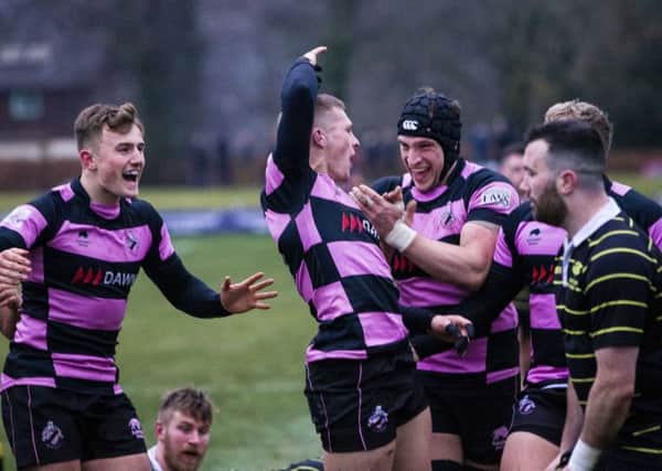Ayr's Kyle Rowe celebrates his try. Pic: SNS/SRU/Bruce White