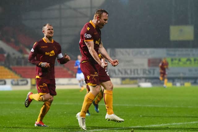 Danny Johnson celebrates his goal for Motherwell. Pic: SNS/Craig Foy