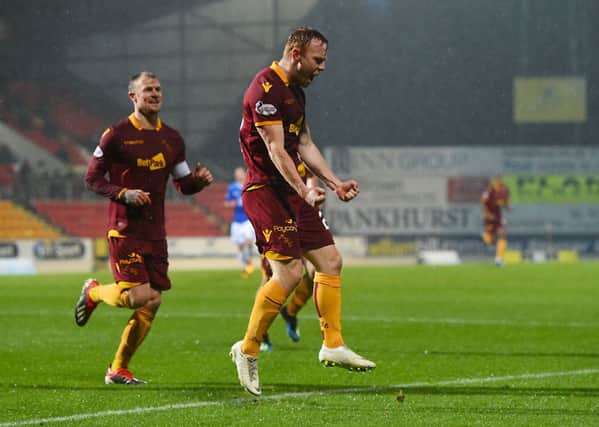 Danny Johnson celebrates his goal for Motherwell. Pic: SNS/Craig Foy