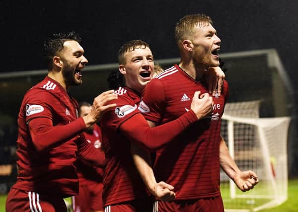 Aberdeen's Sam Cosgrove celebrates. Pic: SNS/Craig Williamson