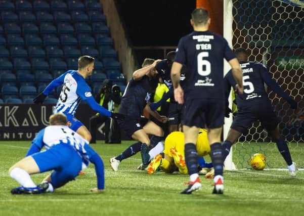The ball trundles over the line to give Kilmarnock the lead. Pic: SNS/Alan Harvey