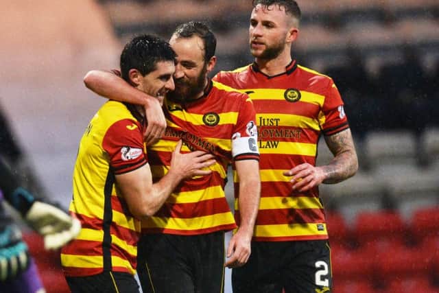 Partick Thistle's Kris Doolan celebrates. Pic: SNS/Sammy Turner