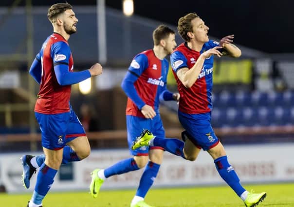 Tom Walsh celebrates his goal for Inverness. Pic: SNS/Roddy Scott