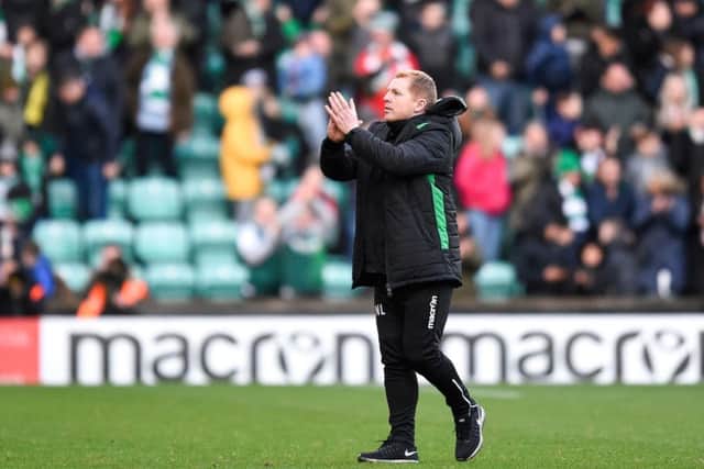 Hibs boss Neil Lennon applauds the Easter Road crowd at full-time. Picture: PA