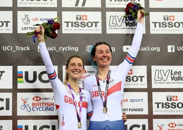 Katie Archibald, right, and Laura Kenny of Great Britain celebrate after winning the women's Madison final in London. Picture: Steven Paston/PA
