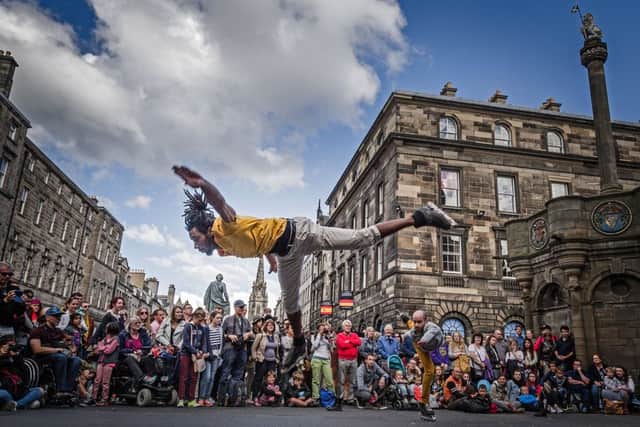 Le Patin Libre from Canada promote their ice show on rollerskates as part of the 2015 Edinburgh Fringe Festival. Picture: Steven Scott Taylor