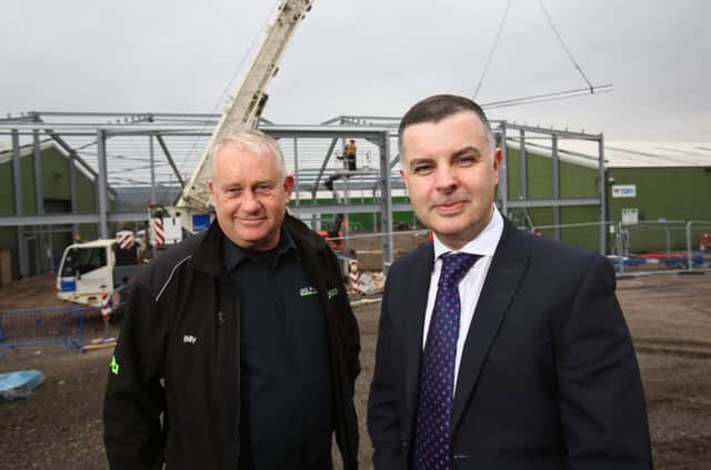 Billy Wilson, director at Jas P Wilson, with Stephen Owens, relationship director at the bank. Picture: Chris Watt