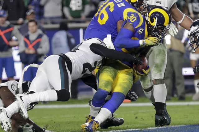 Philadelphia Eagles safety Corey Graham cant stop LA Rams running back Todd Gurley scoring. Picture: Marcio Jose Sanchez/AP