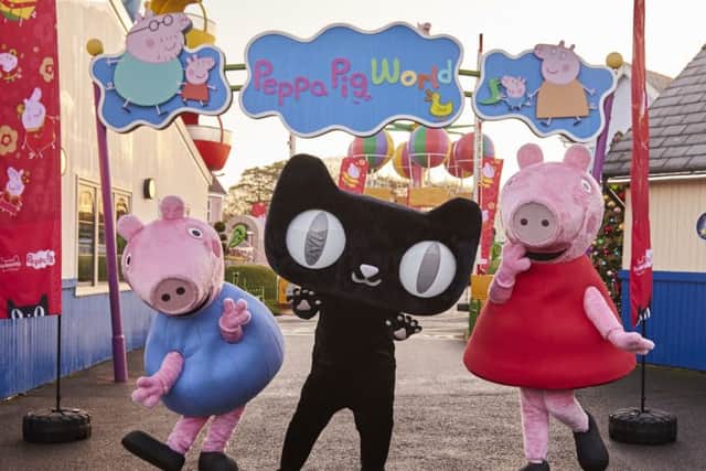 George, Tmall cat, and Peppa Pig at Paultons Park, home of Peppa Pig World, in celebration of Peppa Pig recently being named a super brand by the worlds biggest e-commerce platform, TMall. Picture: Contributed