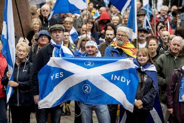 Independence supporters show their support for a second referendum during a march through Glasgow in July. Picture: John Devlin/TSPL