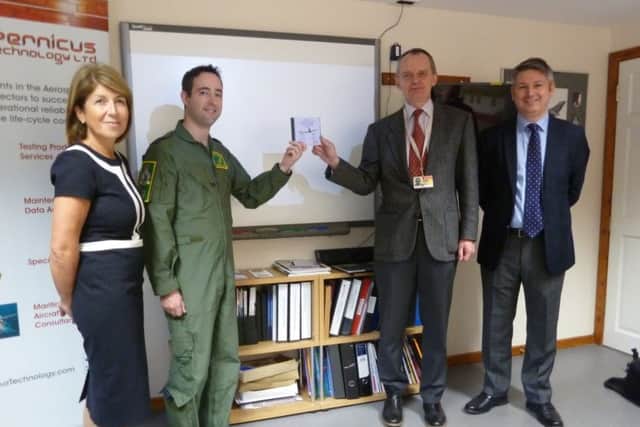 From left: Michelle Sanders, P-8A program leader and MOD defence equipment and support; wing commander James Hanson; Roo Hornby, business development director at Copernicus Technology; Giles Huby, managing director at Copernicus Technology. Picture: Contributed