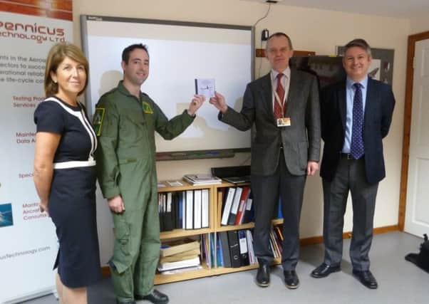 From left: Michelle Sanders, P-8A program leader and MOD defence equipment and support; wing commander James Hanson; Roo Hornby, business development director at Copernicus Technology; Giles Huby, managing director at Copernicus Technology. Picture: Contributed