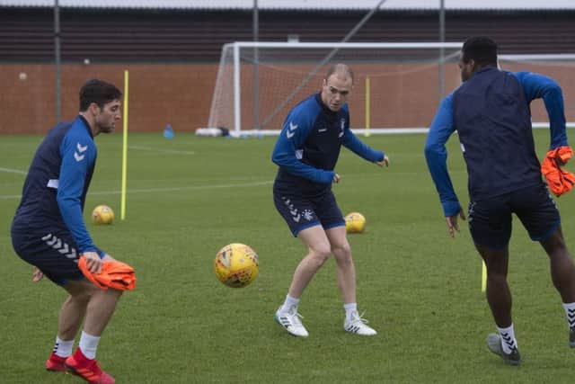 Matthew Polster (left) and Andrew Gutman (centre) train with Rangers at the Hummel Training Centre. Picture: SNS