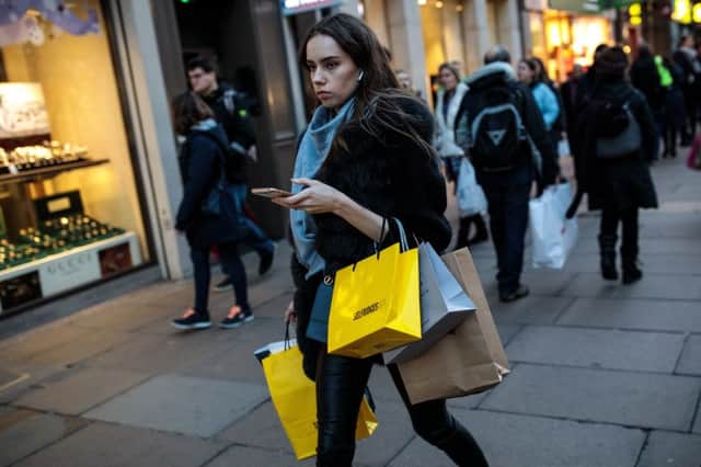 While many shoppers still use their fair share of bags on the high street, a decline in sales of single-use plastic carrier bags - especially in supermarkets - has hit charities. Picture: Getty