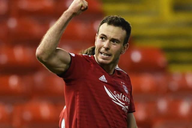 Andrew Considine celebrates after scoring Aberdeen's fifth in their 5-1 win over Dundee.