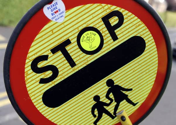 School crossing patrols would be axed under council proposals to bridge the funding gap