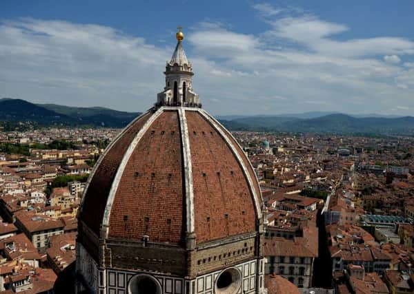 Florence is a beautiful city to visit but anyone thinking about relocating there permanently should realise that life in Italy may not be any better than Brexit Britain (Picture: Tiziana Fabi/AFP/Getty)