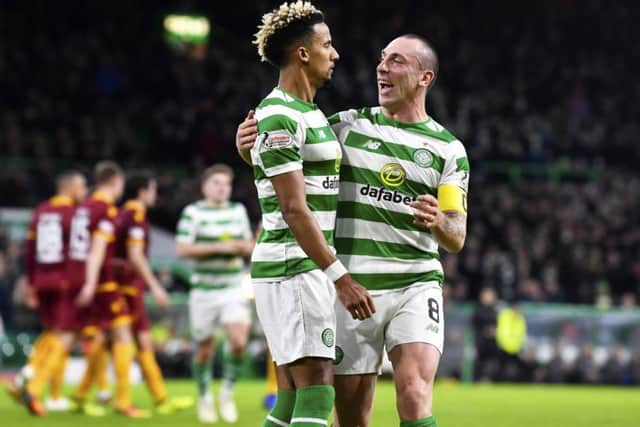 Scott Sinclair celebrates with Scott Brown (right) after scoring to make it 2-0. Picture: SNS