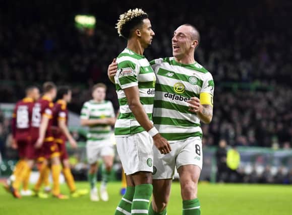 Scott Sinclair celebrates with Scott Brown (right) after scoring to make it 2-0. Picture: SNS