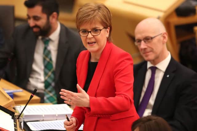First Minister Nicola Sturgeon responded to criticism of the SNP's education record from Labour Leader Richard Leonard. Picture: Jane Barlow/PA Wire