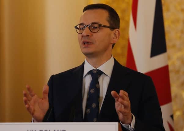 Polish Prime Minister Mateusz Morawiecki is encouraging Poles to return to Poland from the UK. Picture: Alastair Grant/PA Wire