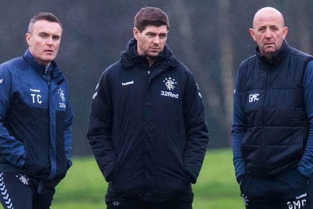 Tom Culshaw, Steven Gerrard and Gary McAllister mull things over at training at Auchenhowie. Picture: SNS Group