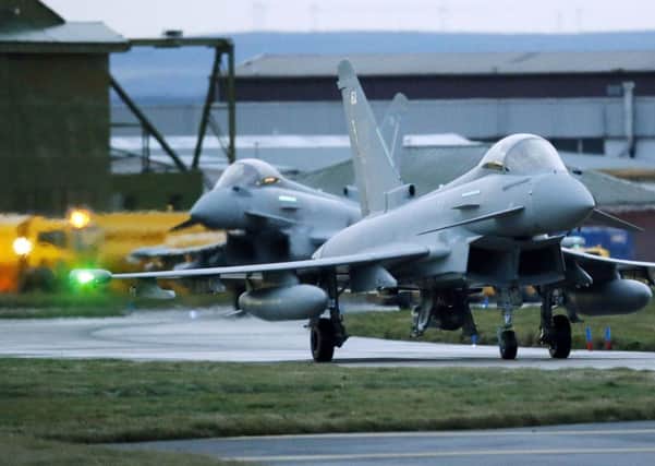 Eurofighter Typhoon jets preparing to take off from RAF Lossiemouth in Morayshire to counter an incursion into UK airspace. Picture: PA