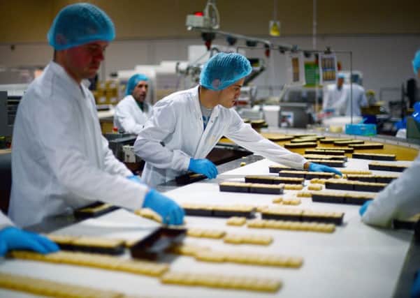 Employees work in the Walkers shortbread factory in Aberlour.  Picture: Jeff J Mitchell/Getty Images