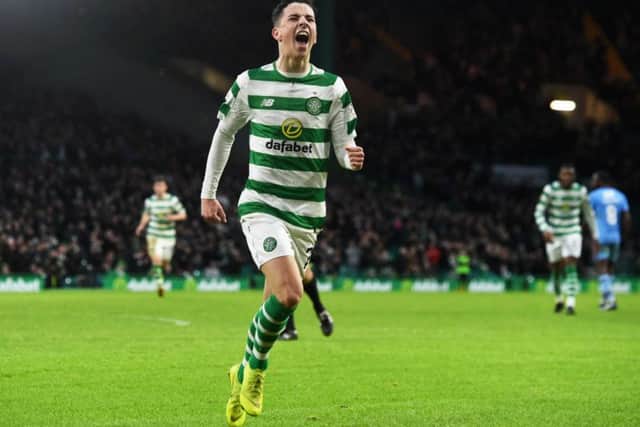 Mikey Johnston celebrates after scoring Celtic's opener. Pic: SNS/Craig Foy