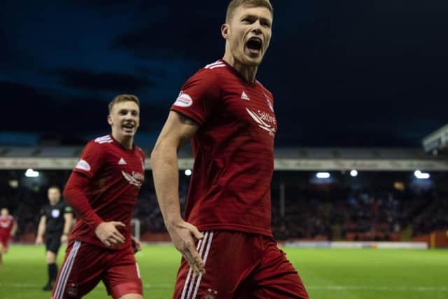 Sam Cosgrove celebrates putting Aberdeen two ahead. Pic: SNS/Ross Parker