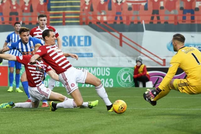 Kilmarnock's Eamonn Brophy scores. Pic: SNS/Paul Devlin