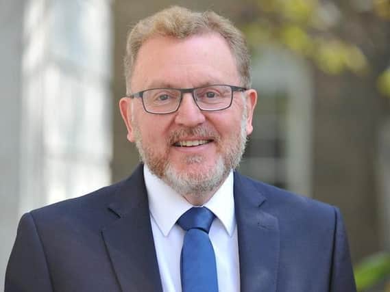 David Mundell suffered a festive Twitter mishap when he 'accidentally' liked a tweet about oral sex (Photo: PA)