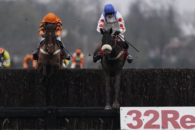 Clan des Obeaux clears the last ahead of Thistlecrack on the to victory in The 32Red King George VI Chase at Kempton. Picture: Alan Crowhurst/Getty