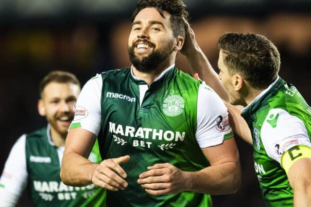 Darren McGregor is all smiles after netting a late equaliser for Hibs against his former club. Picture: SNS Group
