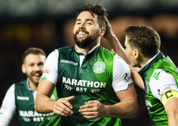 Darren McGregor is all smiles after netting a late equaliser for Hibs against his former club. Picture: SNS Group