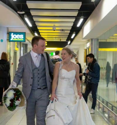 Sarah Elliott, 34, and Paul Edwards, 36, who met on a dating app on 15th December - meet in person for the first time as they fly off to Las Vegas from Gatwick to get married. Picture: SWNS