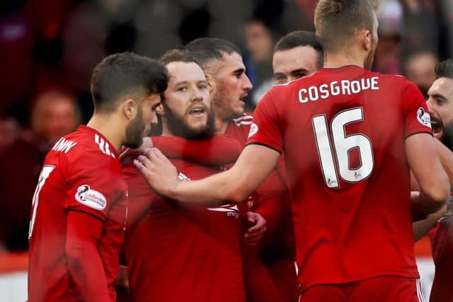 Stevie May was on target from the penalty spot in the 4-3 defeat by Celtic and has struck up a good partnership with Sam Cosgrove. Picture: SNS