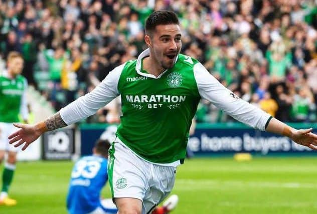 Hibs striker Jamie Maclaren wheels away in delight after scoring for the hosts in their 5-5 draw with Rangers at the end of last season. Picture: SNS