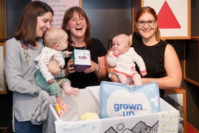 Maree Todd (third left), Minister for Children and Young People, with (left to right)  Sarah Morrison and daughter Chrissie, Gillian Steele  with daughter Erin, marks the first anniversary of the Baby Box initiative at the Museum of Childhood. Picture: Robert Perry/PA Wire