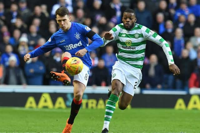 Rangers' Ryan Jack holds off Celtic's Olivier Ntcham. Pic: SNS/Craig Foy