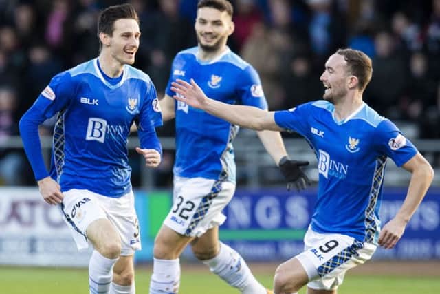 St Johnstone's Scott Tanser(L) celebrates his opener with Chris Kane. Pic: SNS/Kenny Smith