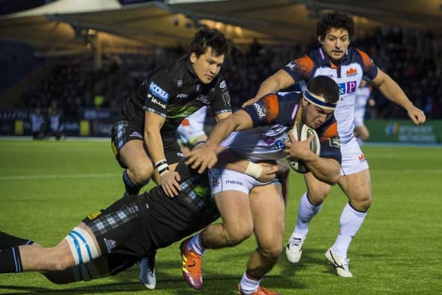 Edinburgh's Stuart McInally powers over for the opening try. Picture: Bill Murray/SNS