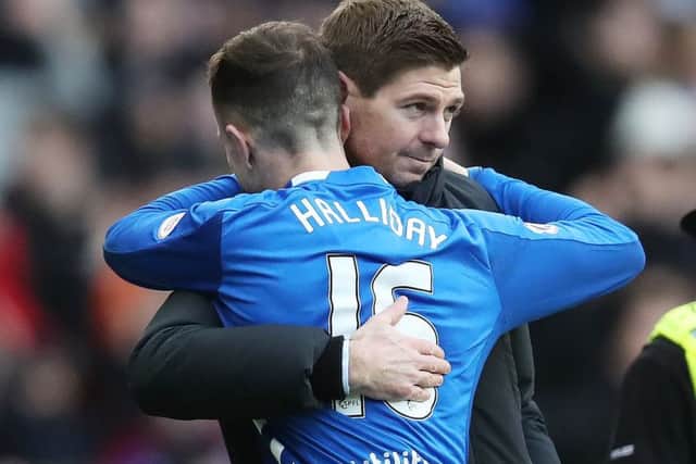 Rangers manager Steven Gerrard hugs Andy Halliday at full time. Picture: Ian MacNicol/Getty Images