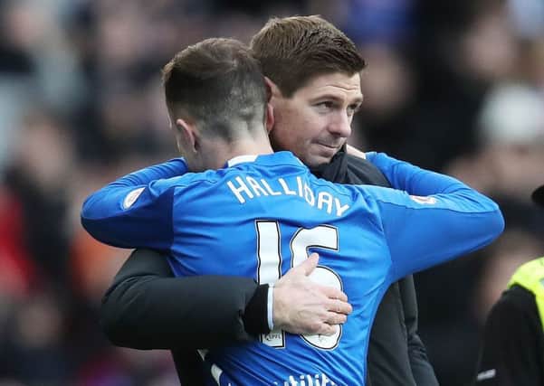Rangers manager Steven Gerrard hugs Andy Halliday at full time. Picture: Ian MacNicol/Getty Images