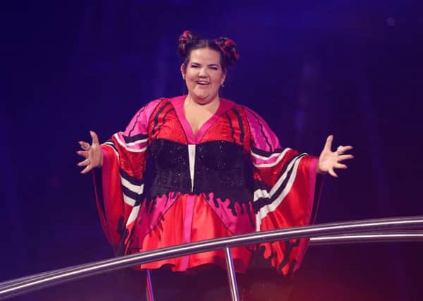 Israel's Netta reacts as she wins the grand final of last year's Eurovision Song Contest. Picture: Reuters/Pedro Nunes