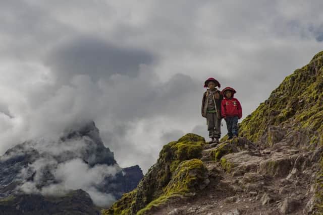 Children on the Lares Trek, which takes backpackers on a higher alternative route through farming villages where the Quechua language is still spoken