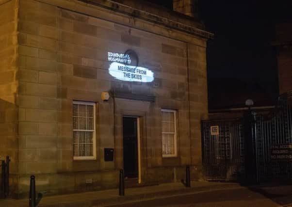 Billy Letford's Love Letter to Europe is projected onto the side of Leith Library as part of Message From The Skies